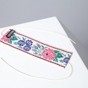 textile bracelet with floral elements