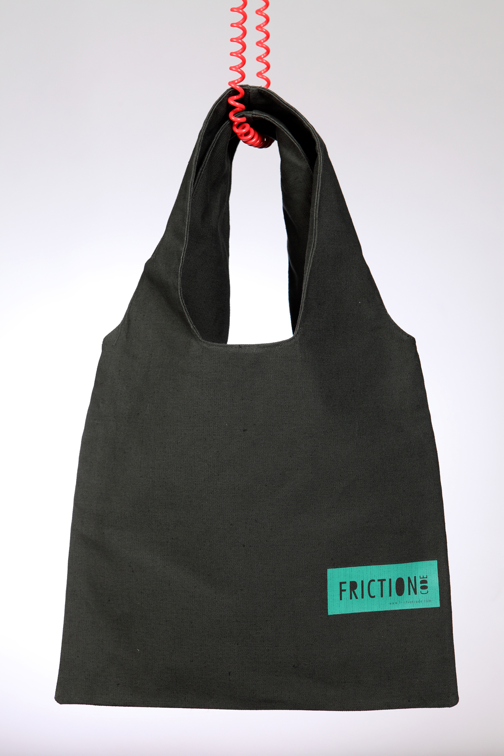 Dark green bag with green label Dark green bag with green label